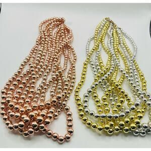 Two Fashion Necklaces-One with Yellow Gold and Silver Beads,The other Rose Gold